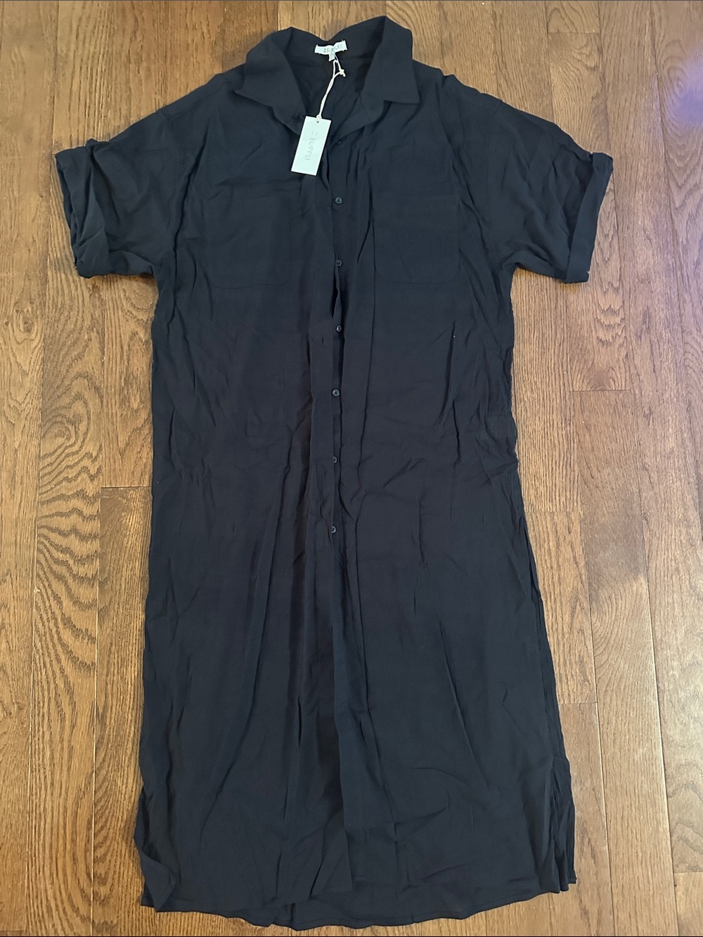 Z Supply Women’s black beach cover up. Can dress up or down. Slits on each side.